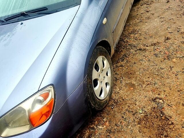 Серый Киа Черато, объемом двигателя 1.6 л и пробегом 200 тыс. км за 3900 $, фото 1 на Automoto.ua