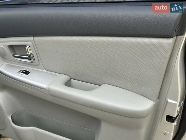 Сірий Кіа Черато, об'ємом двигуна 2 л та пробігом 192 тис. км за 5100 $, фото 8 на Automoto.ua