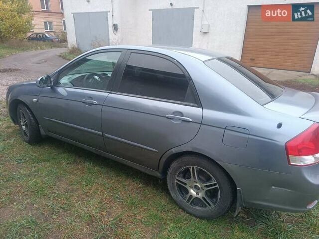 Серый Киа Черато, объемом двигателя 1.98 л и пробегом 230 тыс. км за 3000 $, фото 8 на Automoto.ua