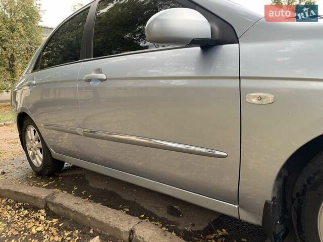 Сірий Кіа Черато, об'ємом двигуна 2 л та пробігом 199 тис. км за 5099 $, фото 13 на Automoto.ua