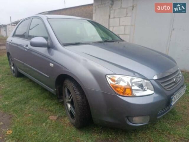 Серый Киа Черато, объемом двигателя 1.98 л и пробегом 230 тыс. км за 3000 $, фото 2 на Automoto.ua