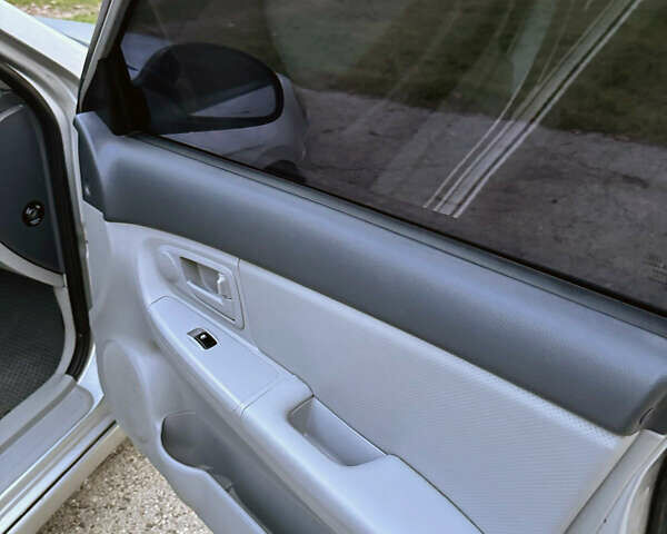 Сірий Кіа Черато, об'ємом двигуна 1.6 л та пробігом 201 тис. км за 5200 $, фото 8 на Automoto.ua