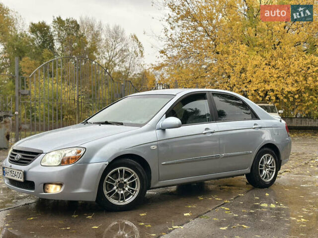 Серый Киа Черато, объемом двигателя 1.58 л и пробегом 495 тыс. км за 3900 $, фото 3 на Automoto.ua