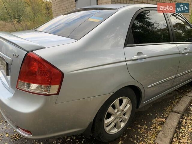 Сірий Кіа Черато, об'ємом двигуна 2 л та пробігом 199 тис. км за 5099 $, фото 17 на Automoto.ua