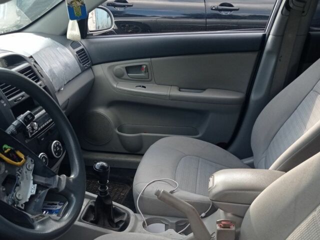 Серый Киа Черато, объемом двигателя 1.6 л и пробегом 130 тыс. км за 2019 $, фото 5 на Automoto.ua