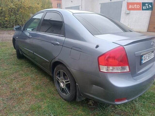 Серый Киа Черато, объемом двигателя 1.98 л и пробегом 230 тыс. км за 3000 $, фото 3 на Automoto.ua