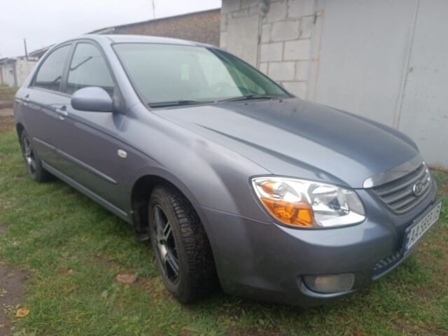 Серый Киа Черато, объемом двигателя 2 л и пробегом 237 тыс. км за 3000 $, фото 3 на Automoto.ua