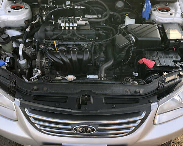 Серый Киа Черато, объемом двигателя 1.6 л и пробегом 213 тыс. км за 4400 $, фото 33 на Automoto.ua