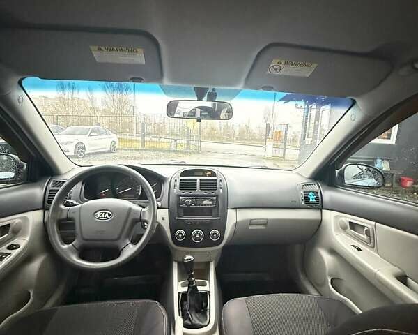 Серый Киа Черато, объемом двигателя 1.59 л и пробегом 243 тыс. км за 4450 $, фото 8 на Automoto.ua