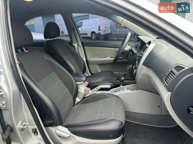 Серый Киа Черато, объемом двигателя 1.98 л и пробегом 188 тыс. км за 4990 $, фото 21 на Automoto.ua