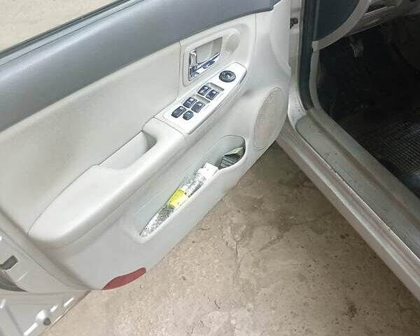 Серый Киа Черато, объемом двигателя 1.59 л и пробегом 229 тыс. км за 5400 $, фото 10 на Automoto.ua