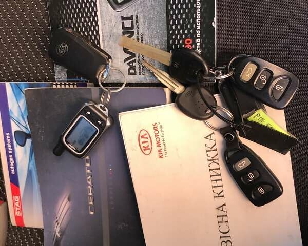 Сірий Кіа Черато, об'ємом двигуна 2 л та пробігом 257 тис. км за 3800 $, фото 27 на Automoto.ua