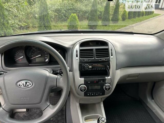 Сірий Кіа Черато, об'ємом двигуна 2 л та пробігом 257 тис. км за 3800 $, фото 17 на Automoto.ua