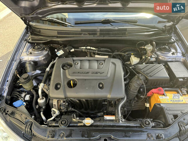 Серый Киа Черато, объемом двигателя 1.6 л и пробегом 140 тыс. км за 4500 $, фото 15 на Automoto.ua