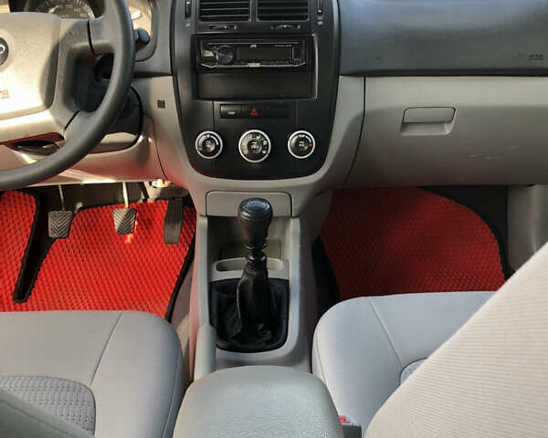 Серый Киа Черато, объемом двигателя 1.6 л и пробегом 213 тыс. км за 4400 $, фото 25 на Automoto.ua