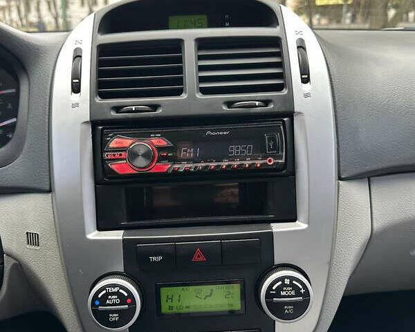 Сірий Кіа Черато, об'ємом двигуна 2 л та пробігом 192 тис. км за 5100 $, фото 18 на Automoto.ua