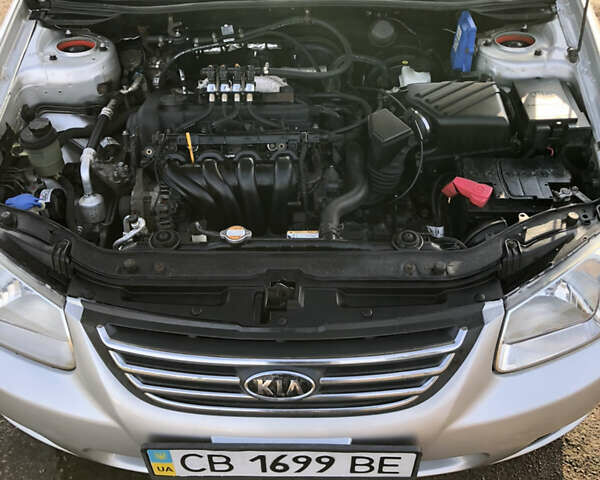 Серый Киа Черато, объемом двигателя 1.6 л и пробегом 213 тыс. км за 4400 $, фото 32 на Automoto.ua