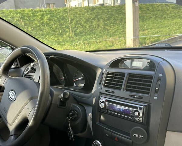 Серый Киа Черато, объемом двигателя 1.6 л и пробегом 140 тыс. км за 4500 $, фото 11 на Automoto.ua