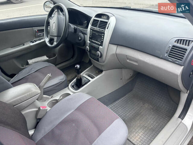 Серый Киа Черато, объемом двигателя 2 л и пробегом 160 тыс. км за 4500 $, фото 5 на Automoto.ua