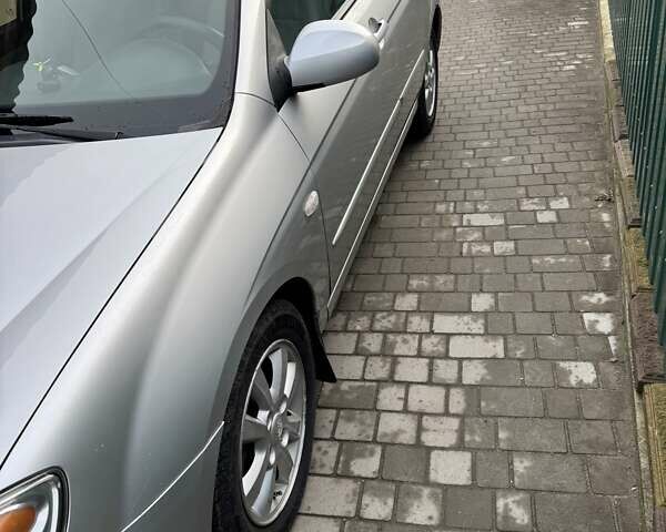 Серый Киа Черато, объемом двигателя 1.6 л и пробегом 181 тыс. км за 4200 $, фото 1 на Automoto.ua