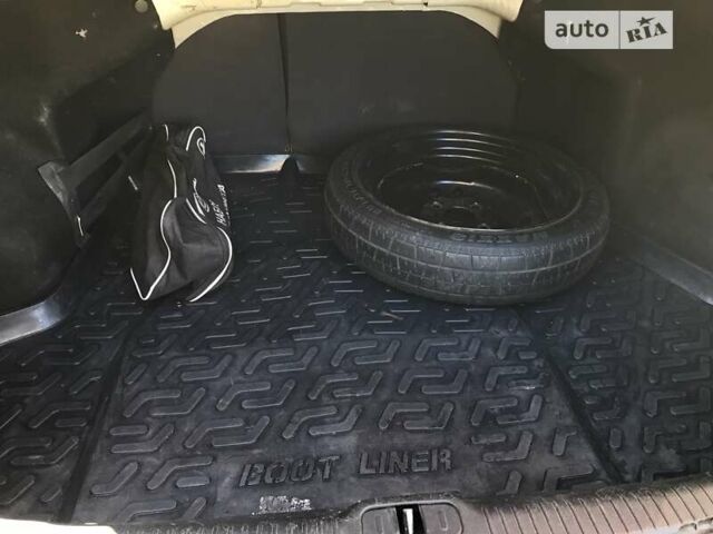 Сірий Кіа Черато, об'ємом двигуна 2 л та пробігом 257 тис. км за 3800 $, фото 29 на Automoto.ua