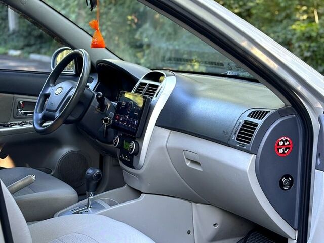 Серый Киа Черато, объемом двигателя 2 л и пробегом 215 тыс. км за 4950 $, фото 8 на Automoto.ua