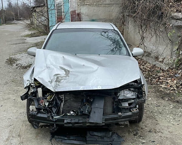 Серый Киа Черато, объемом двигателя 1.6 л и пробегом 210 тыс. км за 1900 $, фото 1 на Automoto.ua