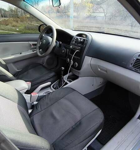 Серый Киа Черато, объемом двигателя 1.6 л и пробегом 176 тыс. км за 5500 $, фото 9 на Automoto.ua