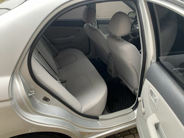 Серый Киа Черато, объемом двигателя 1.6 л и пробегом 180 тыс. км за 4800 $, фото 12 на Automoto.ua