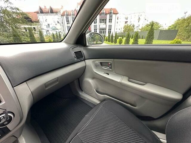 Сірий Кіа Черато, об'ємом двигуна 2 л та пробігом 257 тис. км за 3800 $, фото 20 на Automoto.ua