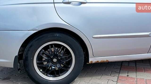 Серый Киа Черато, объемом двигателя 1.6 л и пробегом 250 тыс. км за 5000 $, фото 8 на Automoto.ua