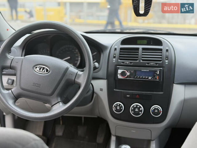 Серый Киа Черато, объемом двигателя 1.59 л и пробегом 196 тыс. км за 4950 $, фото 9 на Automoto.ua