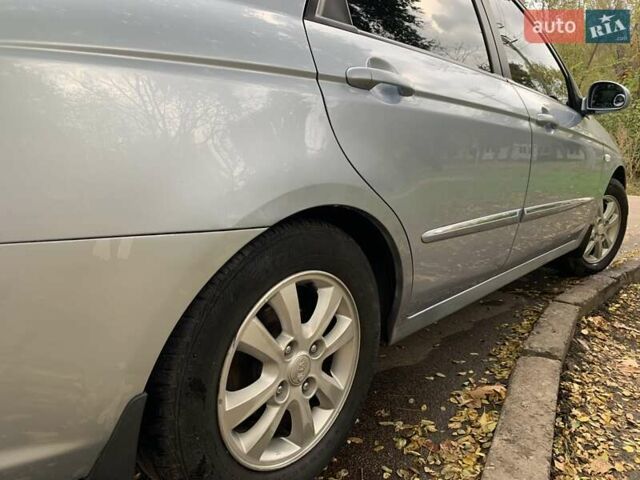 Сірий Кіа Черато, об'ємом двигуна 2 л та пробігом 199 тис. км за 5099 $, фото 11 на Automoto.ua