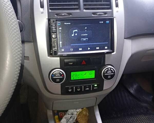 Серый Киа Черато, объемом двигателя 1.59 л и пробегом 229 тыс. км за 5400 $, фото 9 на Automoto.ua