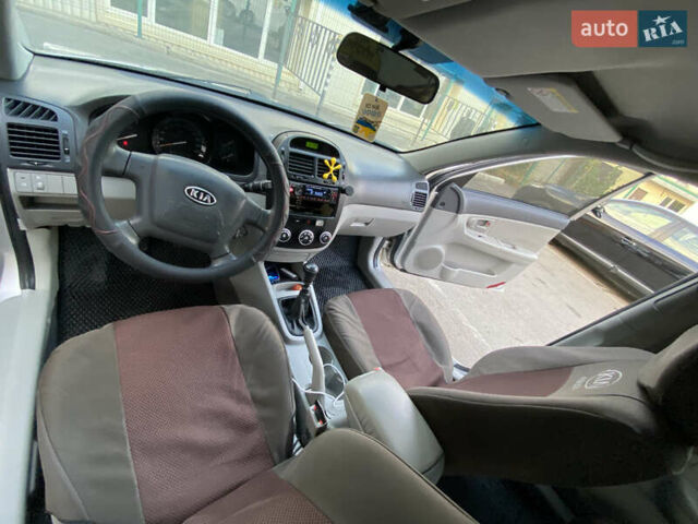 Сірий Кіа Черато, об'ємом двигуна 1.6 л та пробігом 260 тис. км за 4400 $, фото 6 на Automoto.ua
