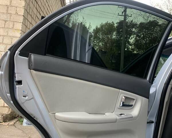 Сірий Кіа Черато, об'ємом двигуна 2 л та пробігом 199 тис. км за 5099 $, фото 3 на Automoto.ua