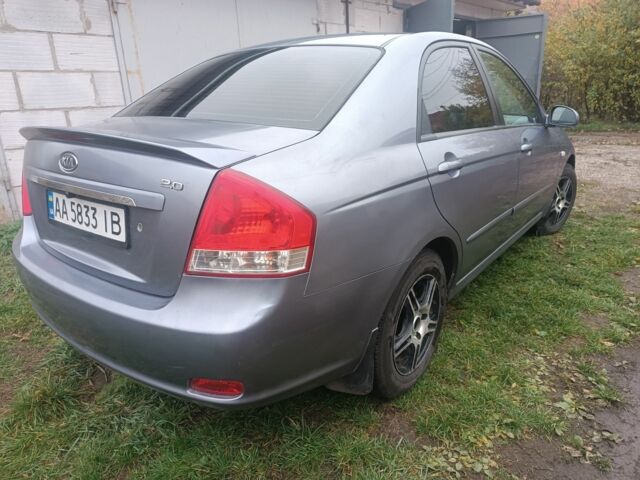 Серый Киа Черато, объемом двигателя 2 л и пробегом 237 тыс. км за 3000 $, фото 5 на Automoto.ua