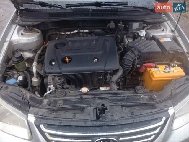 Серый Киа Черато, объемом двигателя 1.6 л и пробегом 220 тыс. км за 3000 $, фото 8 на Automoto.ua