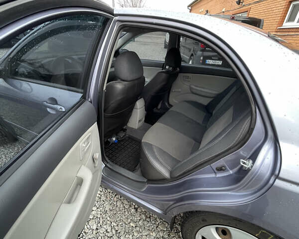 Серый Киа Черато, объемом двигателя 1.59 л и пробегом 144 тыс. км за 4700 $, фото 6 на Automoto.ua