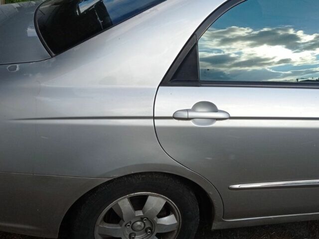 Серый Киа Черато, объемом двигателя 1.6 л и пробегом 130 тыс. км за 2019 $, фото 2 на Automoto.ua