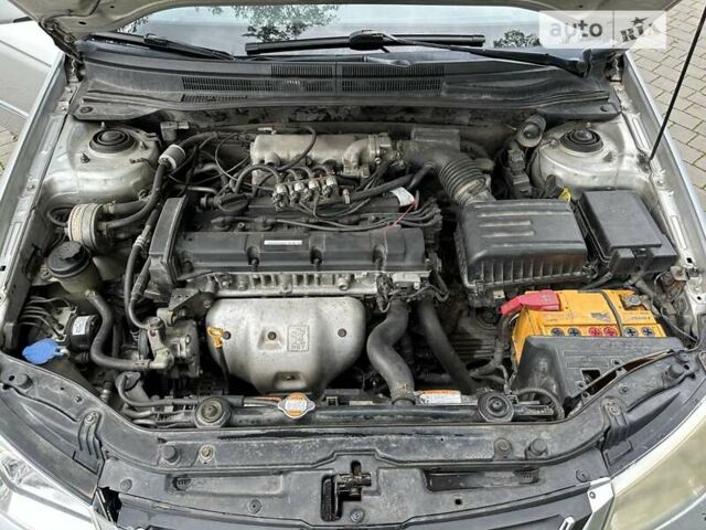 Сірий Кіа Черато, об'ємом двигуна 2 л та пробігом 257 тис. км за 3800 $, фото 13 на Automoto.ua