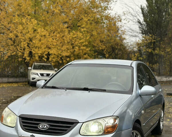 Серый Киа Черато, объемом двигателя 1.58 л и пробегом 495 тыс. км за 3900 $, фото 1 на Automoto.ua