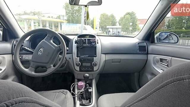 Серый Киа Черато, объемом двигателя 1.6 л и пробегом 250 тыс. км за 5000 $, фото 9 на Automoto.ua