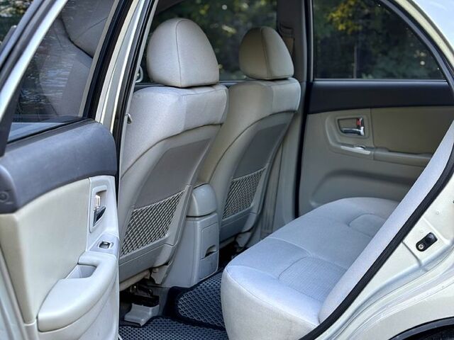 Серый Киа Черато, объемом двигателя 2 л и пробегом 215 тыс. км за 4950 $, фото 6 на Automoto.ua