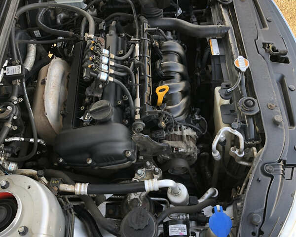 Серый Киа Черато, объемом двигателя 1.6 л и пробегом 213 тыс. км за 4400 $, фото 35 на Automoto.ua