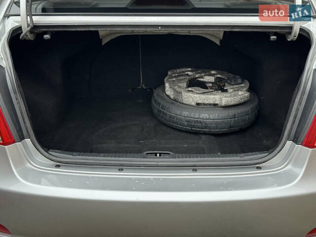 Серый Киа Черато, объемом двигателя 1.6 л и пробегом 180 тыс. км за 4950 $, фото 42 на Automoto.ua