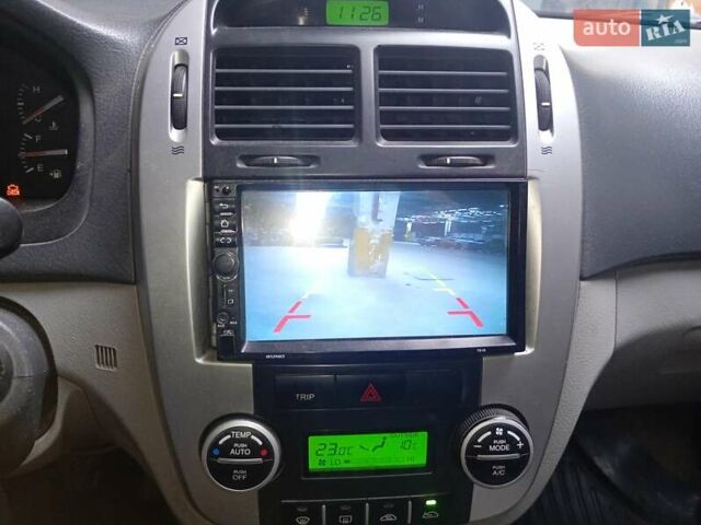 Серый Киа Черато, объемом двигателя 1.59 л и пробегом 229 тыс. км за 5400 $, фото 11 на Automoto.ua