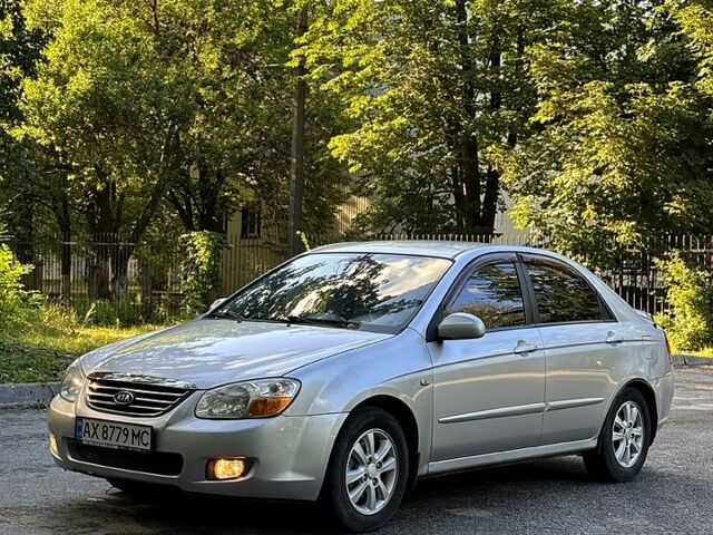 Серый Киа Черато, объемом двигателя 2 л и пробегом 215 тыс. км за 4950 $, фото 4 на Automoto.ua