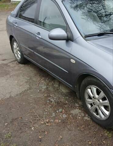 Серый Киа Черато, объемом двигателя 1.6 л и пробегом 158 тыс. км за 4500 $, фото 2 на Automoto.ua