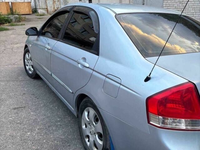Сірий Кіа Черато, об'ємом двигуна 1.6 л та пробігом 247 тис. км за 2200 $, фото 5 на Automoto.ua